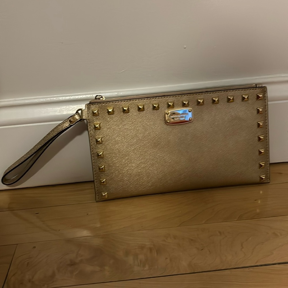 Michael Kors gold studded wristlet